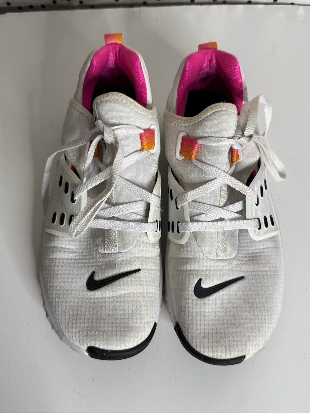 Nike White Sneakers with Pink Lining and Black Swoosh